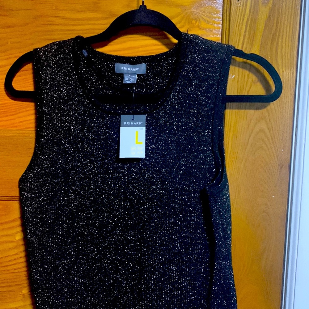 Black/gold body suit.